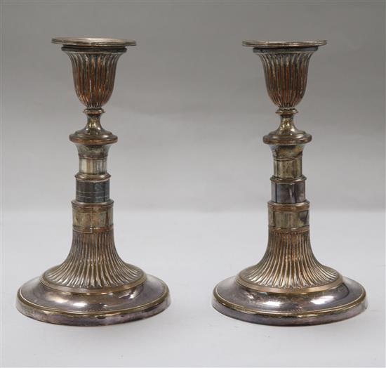 A pair of Regency telescopic plated candlesticks
